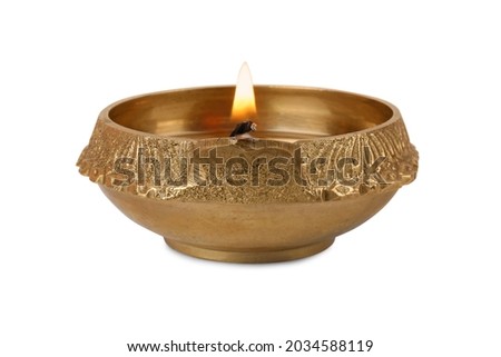 Lit diya lamp isolated on white. Diwali celebration Royalty-Free Stock Photo #2034588119