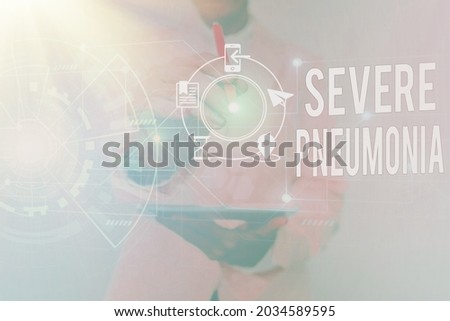 Text sign showing Severe Pneumonia. Conceptual photo acute disease that is marked by inflammation of lung tissue Woman In Uniform Standing Holding Tablet Showing Futuristic Interface.