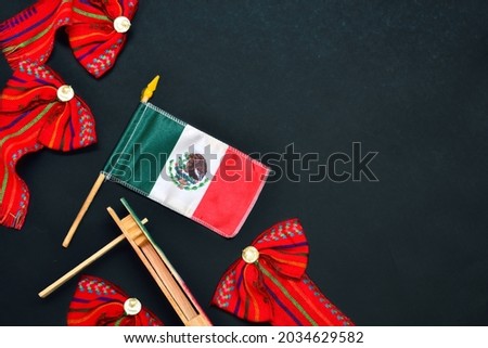 Mexico Independence celebration background, with Mexico flag and folkloric decoration.