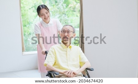 Caregiver caring for a senior man