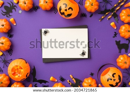 Top view photo of halloween decorations pumpkin baskets candy corn spiders web cat bats silhouettes straws black envelope and white card on isolated violet background with empty space