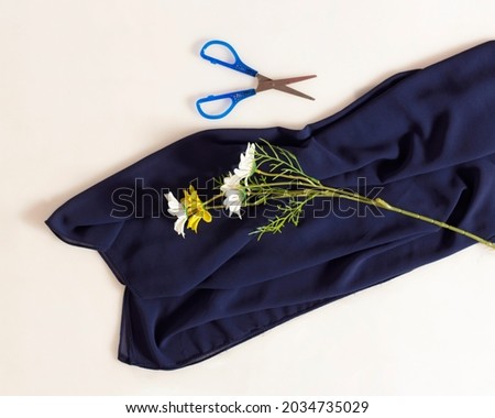 Hijab with soft colors isolated on bright background. Hijab is used to cover the head. For Muslims, the hijab is a veil that aims to cover the hair (aurat) of Muslim women. Hijab Mockups. Focus blur.