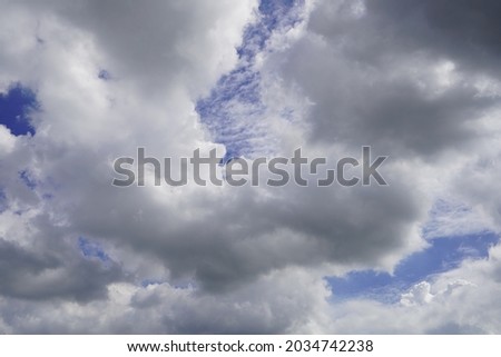 Cloudy sky after rain with cloud full frame of picture bright white and blue sky color on the day outdoor in rainy season tropical zone