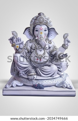 Beautiful Lord Ganesha on grey background, ganpati festival  Royalty-Free Stock Photo #2034749666