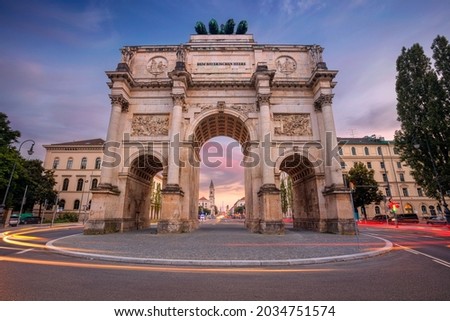  Munich, Germany. Cityscape image of Munich, Bavaria, Germany with the Siegestor at summer sunset. Royalty-Free Stock Photo #2034751574