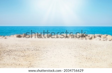 Beach summer background, Seascape,  blue sky, turquoise sea and white sand, sun shines tenderly, Holiday summer beach background. soft selective focus.