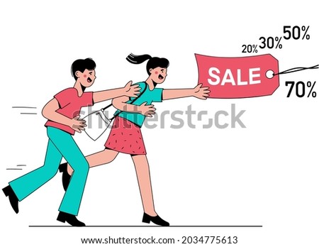 Man and a woman run after a label with the inscription "Sale". Day of big discounts.
