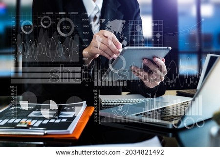 Data Management System with Business Analytics concept. business team hands working with provide information for Key Performance Indicators and marketing analysis onn virtual computer  Royalty-Free Stock Photo #2034821492