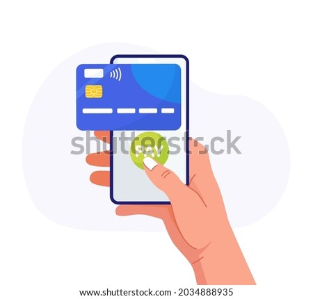 Pay by credit card via electronic wallet on phone. Mobile banking app, contactless payment. Hand holds smartphone with virtual bank card. Shopping by phone and connected credit card, digital money. Royalty-Free Stock Photo #2034888935