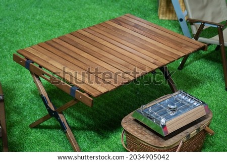 Folding  wooden table for camping.