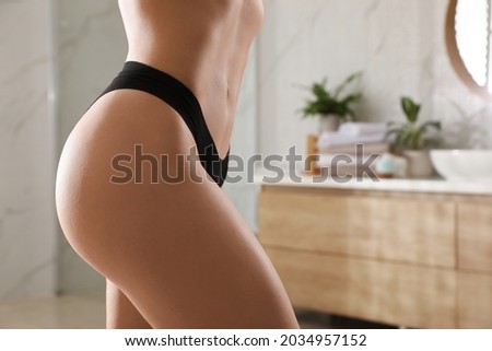 Closeup view of slim woman in underwear at home, space for text. Cellulite problem concept
