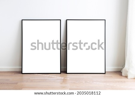 Modern neutral room with mock up frames.