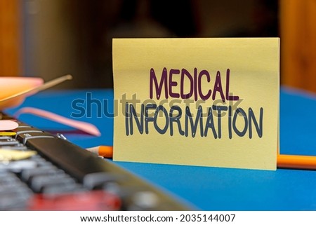 Text caption presenting Medical Information. Word Written on Healthrelated information of a patient or a person Multiple Assorted Collection Office Stationery Photo Placed Over Table