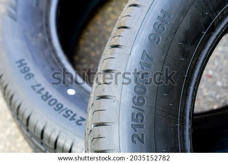 Side view of tire with tire width, height and wheel diameter designation Royalty-Free Stock Photo #2035152782