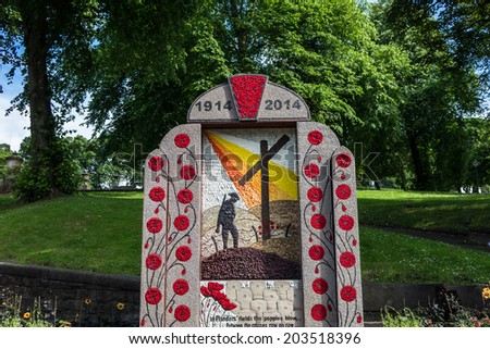 Well dressing in Buxton, Derbyshire celebrating the great war centennial. A summer tradition in which wells, springs or other water sources are decorated with designs created from flower petals.