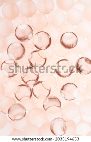 Cosmetic collagen serum care ingredient textured background  Royalty-Free Stock Photo #2035194653