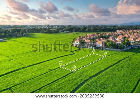 Land plot in aerial view. Gps registration survey of property, real estate for map with location, area. Concept for residential construction, development. Also home or house for sale, buy, investment. Royalty-Free Stock Photo #2035239530
