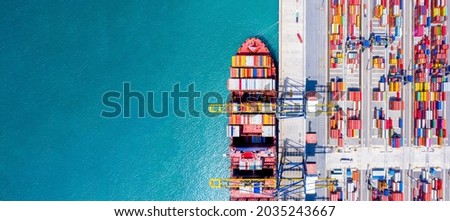 Aerial top view of International Containers Cargo ship in ocean, Freight Transportation,Shipping,Nautical Vessel. Logistics import export Container Cargo ship over sea. OverseaTransport business. Royalty-Free Stock Photo #2035243667