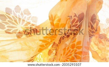 orange red yellow floral, A foulard is a lightweight fabric, either twill or plain-woven, made of silk or a mix of silk and cotton. Texture, backgroun