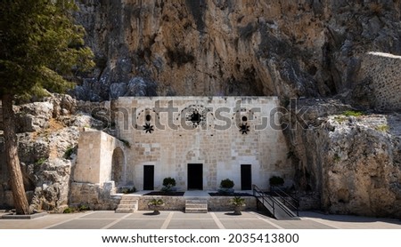 Facade of the cave church St. Pierre in Hatay, Turkey Royalty-Free Stock Photo #2035413800