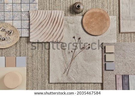 Flat lay of creative architect moodboard composition with samples of building, neutral textile and natural materials and personal accessories. Top view, template.