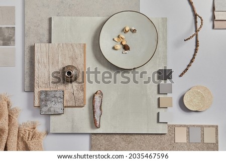 Flat lay of creative architect moodboard composition with samples of building, textile and natural materials and personal accessories. Top view,  white background, template. Royalty-Free Stock Photo #2035467596