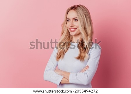 Profile portrait of successful businesswoman crossed arms shiny smile on pink background
