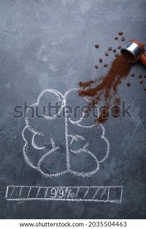 Creative composition with coffee and drawn human brains on dark background