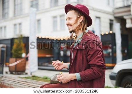 Close up of handsome man having musical performance Royalty-Free Stock Photo #2035511240