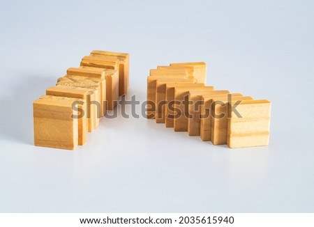Abstract concept of wooden cubes toy stack to tower.