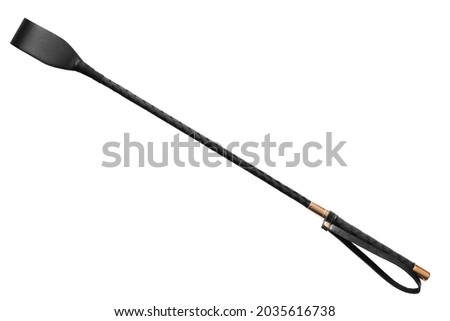 Black leather whip isolated on white background Royalty-Free Stock Photo #2035616738