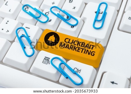 Hand writing sign Clickbait Marketing. Business concept Online content that aim to generate page views Writing Interesting Online Topics, Typing Office Annoucement Messages