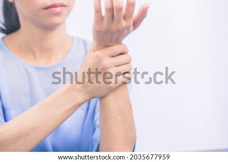 Carpal tunnel syndrome. woman suffering from wrist pain.