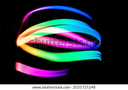 Light Painting Lines of Colour.LED lighting design style,night lights, drawing with LED lights,Storm of Light Royalty-Free Stock Photo #2035725248