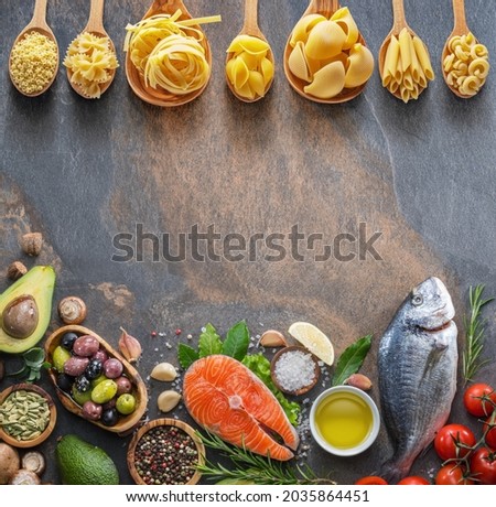 Fish, vegetables and different pasta the main ingredients of Mediterranean cuisine. Lay out.