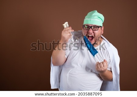 Funny fat doctor with test tubes. Brown background.