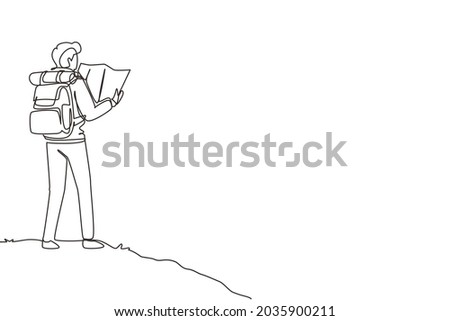 Single continuous line drawing man hiker with backpack and map hiking in mountains or forest and exploring nature. Active outdoor travelling. Dynamic one line draw graphic design vector illustration