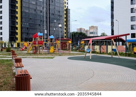 Playground in the courtyard of a modern residential building