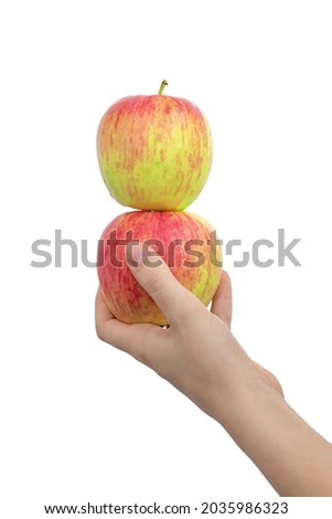 Healthy red apples isolated on a white background, in female hand photo
