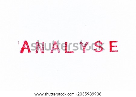 Red color rubber stamp in word analyse on white paper background