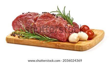 Fresh beef meat with spices, isolated on white background Royalty-Free Stock Photo #2036024369