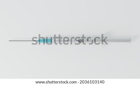 Photo of a isolated vaccine syringe made of plastic, with white plunge and cyan needle cup. Covid-19 and flu vaccination. Loaded and ready for inoculation. Royalty-Free Stock Photo #2036103140