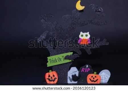 Halloween Trick or Treat Tree on Black Background