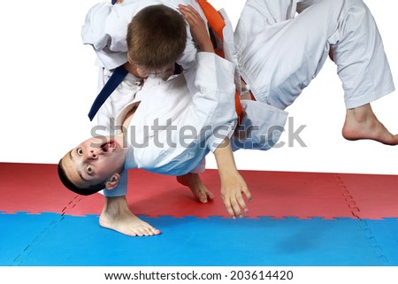 Nage-waza technique in performing sportsman with a blue belt Royalty-Free Stock Photo #203614420