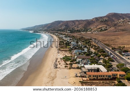 Luxury beachfront properties in Malibu, California, drone view.  Royalty-Free Stock Photo #2036188853