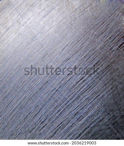 seamless background of metal scratches light reflections
