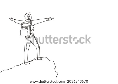 Single continuous line drawing climber man stands with arms outstretched on top of mountain. Winner motivational concept. Tourist with backpack. Traveler in summer rocks. One line draw design vector