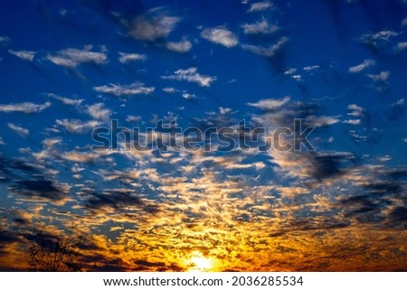 Vibrant sky with gradients and clouds at sunset 