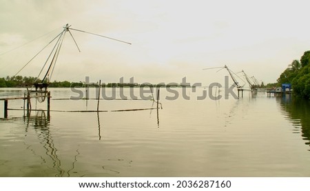 View of the fishing nets in a lake , pictured from different angles
