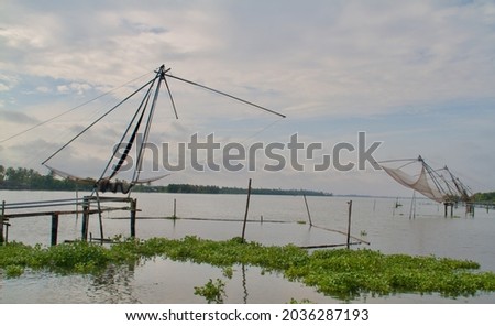 View of the fishing nets in a lake , pictured from different angles